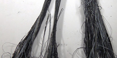 连续长丝graphite-coated聚四氟乙烯纱线。